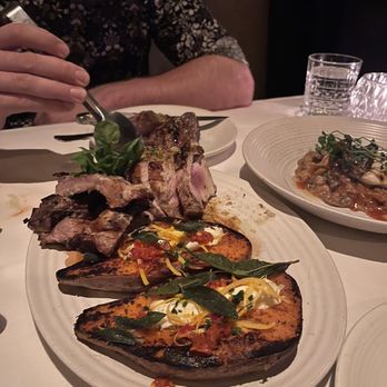 J Carver’s - Porch chop with coal roasted sweet potatoes - Steakhouses Near Me - Austin, Texas
