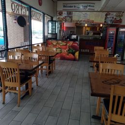 The dining area. About a dozen tables inside and some outside. The dining area. About a dozen tables inside and some outside.