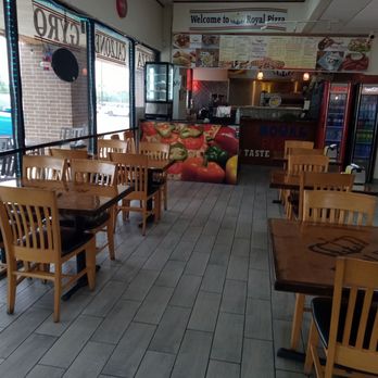 Royal Pizza - The dining area. About a dozen tables inside and some outside. - Pizza Near Me - San Antonio, Texas Royal Pizza - The dining area. About a dozen tables inside and some outside. - Pizza Near Me - San Antonio, Texas