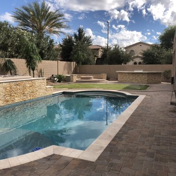 Alrey's Landscaping - a pool in a backyard - Landscaping Near Me