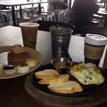 Tout Suite - Our meals together. Pastry plate on the left, Vietnamese steak and eggs on the right. - Cafes Near Me - Houston, Texas