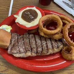NY Strip, potatoes, onion rings