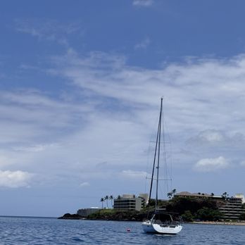 Salty Dog Sailing Maui - Another Benetton boat close to the shoreline - Sailing Near Me - Lahaina, Hawaii Salty Dog Sailing Maui - Another Benetton boat close to the shoreline - Sailing Near Me - Lahaina, Hawaii