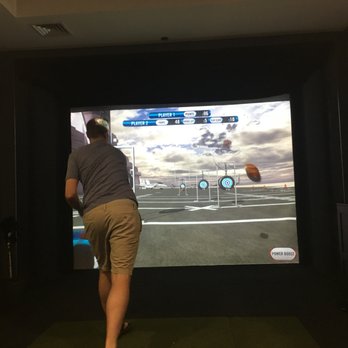 Crush It! Sports Lounge - Football target practice on an aircraft carrier - Sports Bars Near Me - Grapevine, Texas