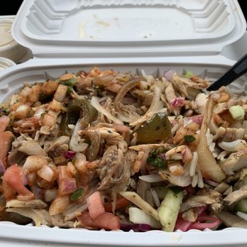 Momi's Kitchen - Chicken shawarma platter with tahini sauce on the side. - Mediterranean Near Me - Waldorf, Maryland Momi's Kitchen - Chicken shawarma platter with tahini sauce on the side. - Mediterranean Near Me - Waldorf, Maryland