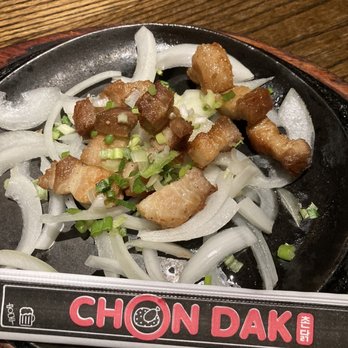 Chon Dak - $28 worth of onions with a side of 10 tiny pieces of pork belly. I counted. - Bars Near Me - Gardena, California