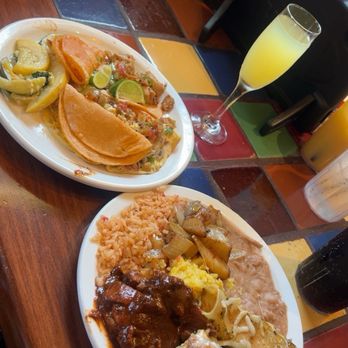 El Torito - Everything on this plate was so delicious! Crunchy quesadillas, a omelette, mole, rice, and beans - Mexican Near Me - West Covina, California