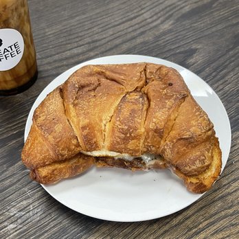 Qreate Coffee + Studio - sausage egg and cheese croissant - Coffee & Tea Near Me - Orlando, Florida Qreate Coffee + Studio - sausage egg and cheese croissant - Coffee & Tea Near Me - Orlando, Florida