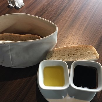Loveria Caffè Taste Of Italy - Oven fresh bread with balsamic reduction sauce and olive oil. - Italian Near Me - Colleyville, Texas Loveria Caffè Taste Of Italy - Oven fresh bread with balsamic reduction sauce and olive oil. - Italian Near Me - Colleyville, Texas