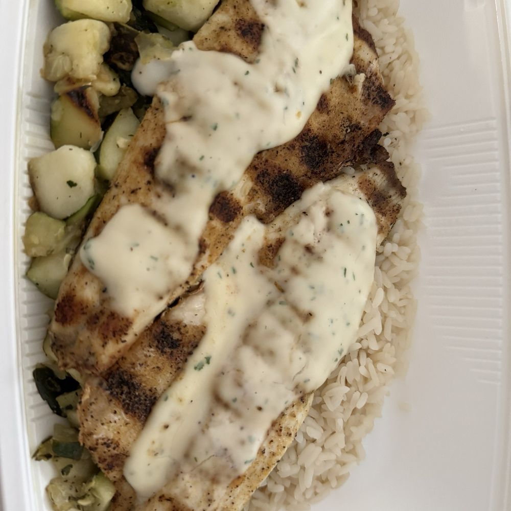 California Fish Grill - BRANZINO (SEA BASS) w/ garlic butter sauce, white rice and DICED ZUCCHINI & ROSEMARY - Seafood Near Me - San Diego, California California Fish Grill - BRANZINO (SEA BASS) w/ garlic butter sauce, white rice and DICED ZUCCHINI & ROSEMARY - Seafood Near Me - San Diego, California