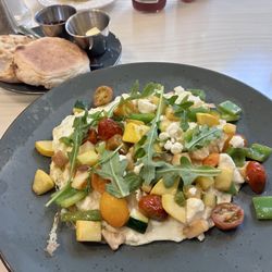 Coastal Cantina - Egg whites veggies and goat cheese. English muffin. Traveling lighter.