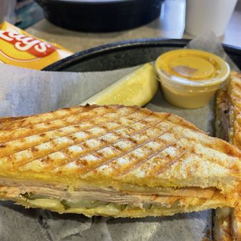 Midtown Deli - Cuban Panini with mustard and baked lays - Delis Near Me - Greenville, South Carolina Midtown Deli - Cuban Panini with mustard and baked lays - Delis Near Me - Greenville, South Carolina