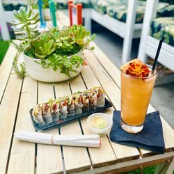 The Flamingo House - Happy Hour 4-7pm M-Fr. $20 grapefruit Paloma with the Flamingo roll deal
