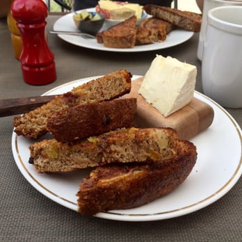 Five Points Bakery - Apple cider toast with triple cream brie, marble rye with Swiss, salami, and garlic pickles - Bakeries Near Me - Buffalo, New York