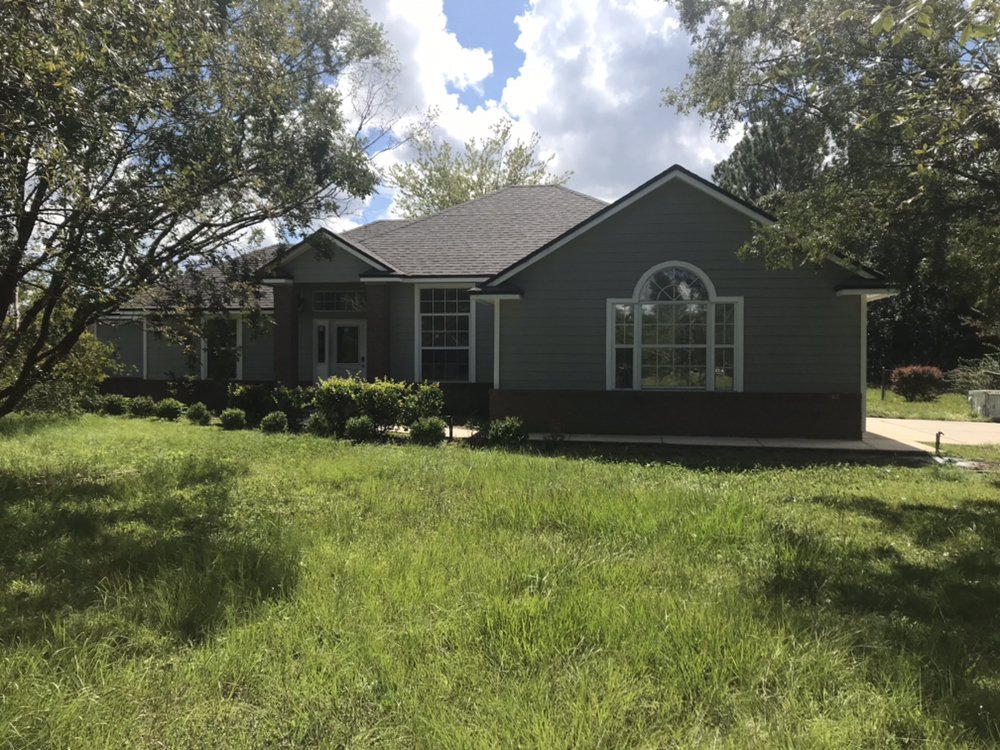 Slide of Priority 1 Roofing and Construction