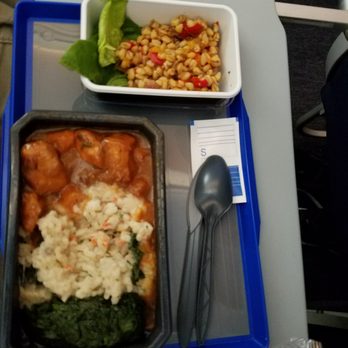 United Airlines - Chicken with risotto was delicious - Airlines Near Me - Hounslow, XGL