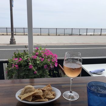 Rooney's Oceanfront Restaurant - Rosè and homemade hummus w/ chips - Seafood Near Me - Long Branch, New Jersey Rooney's Oceanfront Restaurant - Rosè and homemade hummus w/ chips - Seafood Near Me - Long Branch, New Jersey