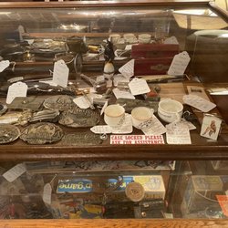 The Cotton Exchange - WWII paraphernalia - love those ashtrays - smush your cigarette in Hitler's face LOL