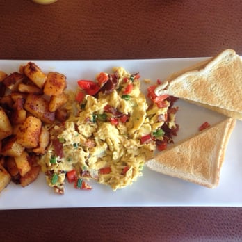 Rozie's Breakfast Cafe - 'Omlett Scrambled' with bacon, onions, red pepper and potatoes and toast as sides. - Breakfast & Brunch Near Me - St Catharines, Ontario Rozie's Breakfast Cafe - 'Omlett Scrambled' with bacon, onions, red pepper and potatoes and toast as sides. - Breakfast & Brunch Near Me - St Catharines, Ontario