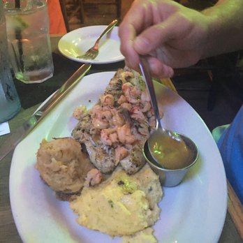 Bon Temps Grill - Some yummy fish with yummy seafood yum mines on top. - Cajun/Creole Near Me - Lafayette, Louisiana