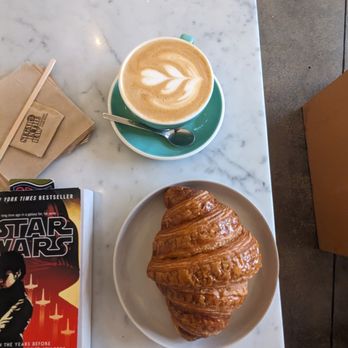 Eightfold Coffee - Cappuccino and croissant (please ignore the book I'm reading ) - Coffee & Tea Near Me - Los Angeles, California Eightfold Coffee - Cappuccino and croissant (please ignore the book I'm reading ) - Coffee & Tea Near Me - Los Angeles, California