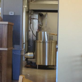 Feldman's Bagels - New bagel boiler and bagels getting taken out of the oven. - Bagels Near Me - Burlington, Vermont Feldman's Bagels - New bagel boiler and bagels getting taken out of the oven. - Bagels Near Me - Burlington, Vermont