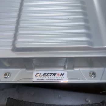 Electron Automotive - Battery unit with electrons seal. - Auto Repair Near Me - Orange, California Electron Automotive - Battery unit with electrons seal. - Auto Repair Near Me - Orange, California