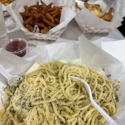 Crazy Crab - These are the garlic noodles. They were good but As I got down further I was good. Way to much melted Butter.
