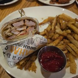 Gahan House Port City - Grilled chicken wrap with side of fries