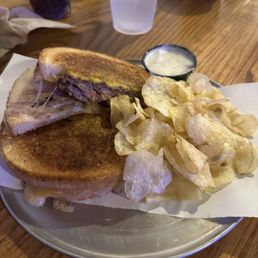 Patty melt with fresh chips.