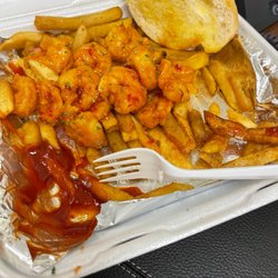 Dat Kitchen - POW POW shrimp - sweet and spicy sauce almost similar to sweet heat sauce ig not the same sauce. I added the ketchup. Fries were ok.