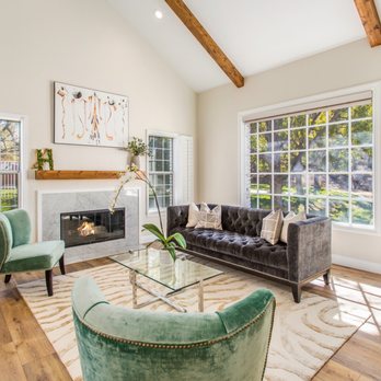 MJ Remodel - a spacious living room with a fireplace - General Contractors Near Me - Riverside, California