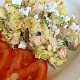 Salmon scramble with chèvre and tomatoes Salmon scramble with chèvre and tomatoes