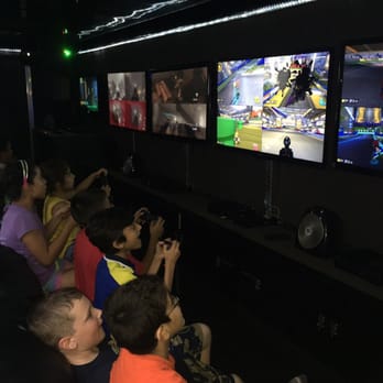 GameTruck - Inside! Black comfy couches! - Game Truck Rental Near Me