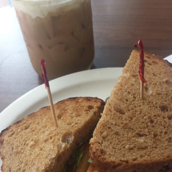 Cure Coffeehouse - Club sandwich with cucumbers and iced White Out latte. Mhmmm! - Coffee & Tea Near Me - Norfolk, Virginia Cure Coffeehouse - Club sandwich with cucumbers and iced White Out latte. Mhmmm! - Coffee & Tea Near Me - Norfolk, Virginia
