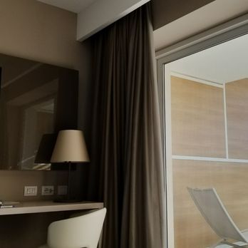 Almar Jesolo Resort & Spa - View from bed onto patio - Hotels Near Me - Lido di Jesolo, VE Almar Jesolo Resort & Spa - View from bed onto patio - Hotels Near Me - Lido di Jesolo, VE