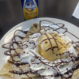 Classic Crêpe with whipped cream and ice cream Classic Crêpe with whipped cream and ice cream