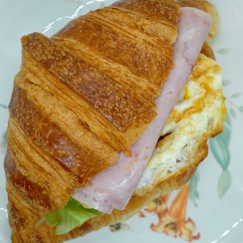 Wheatfield Bakery - "Bacon Croissant Sandwich": $3.50. Actually a ham croissant sandwich, with one egg, tomato, and lettuce. Well-constructed. Take-out. - Bakeries Near Me - Brooklyn, New York