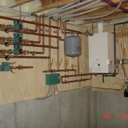American Home Systems - Gas wall hung boiler with radiant heat
