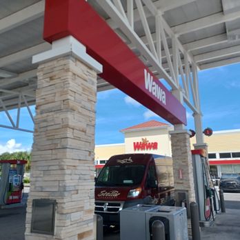 Wawa - a van parked at a gas station - Gas Stations Near Me - Cocoa, Florida
