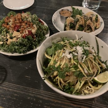 Avo - Clockwise from top right: Kimchi Spring Rolls, Pad Thai, Kale Caesar - Cocktail Bars Near Me - Nashville, Tennessee Avo - Clockwise from top right: Kimchi Spring Rolls, Pad Thai, Kale Caesar - Cocktail Bars Near Me - Nashville, Tennessee
