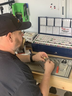 Program Car Keys - When your key no longer starts your car or you have lost the keys to your car equipped with anything from the original VATS systems to the latest smart keys, we are here to help. Our in-house programming capabilities mean we have the key cutters and the programmers to ensure that we are able to service every customer’s needs. We also offer programming of new remotes or keys. You can even bring us a remote or other keys to be programmed to your vehicle.

We have an experienced locksmith on staff so that our customers don’t have to wait long for their keys to be re-programmed. Our locksmith also offers remote programming including factory and after-market remotes.

We provide a wide variety of services to the public from cutting keys to replacing locks, as well as remote programming of new vehicle remotes.

We work hard to find the right locks and keys for EACH customer. We can even offer a re-key service that saves you the time and trouble of replacing all your locks. For more information, call us at 901-609-9179.