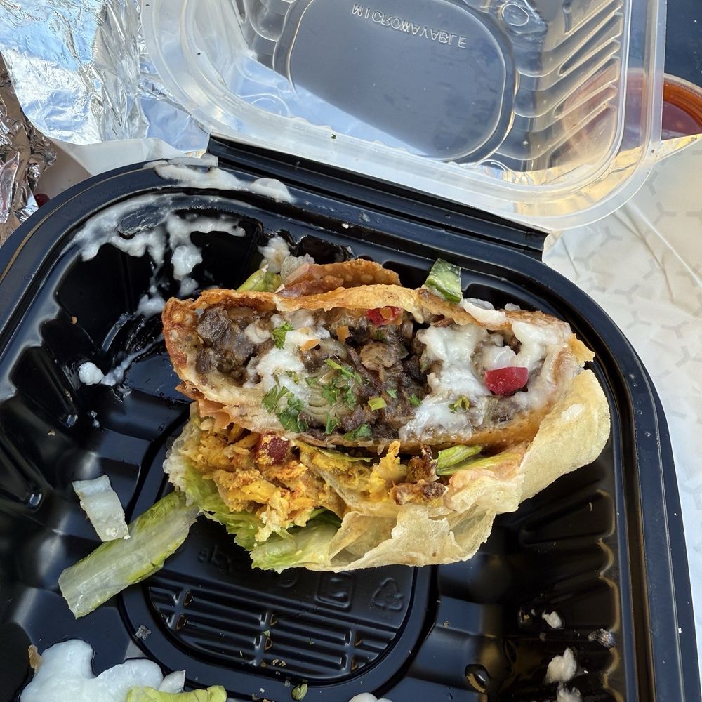 Shawarma Guys - This is the Greek wrap with the wagyu beef egg rolls put inside by me. - Food Trucks Near Me - San Diego, California Shawarma Guys - This is the Greek wrap with the wagyu beef egg rolls put inside by me. - Food Trucks Near Me - San Diego, California