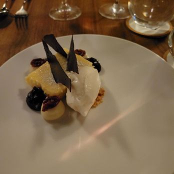 Bûcheron - a dessert on a white plate - French Near Me - Minneapolis, Minnesota