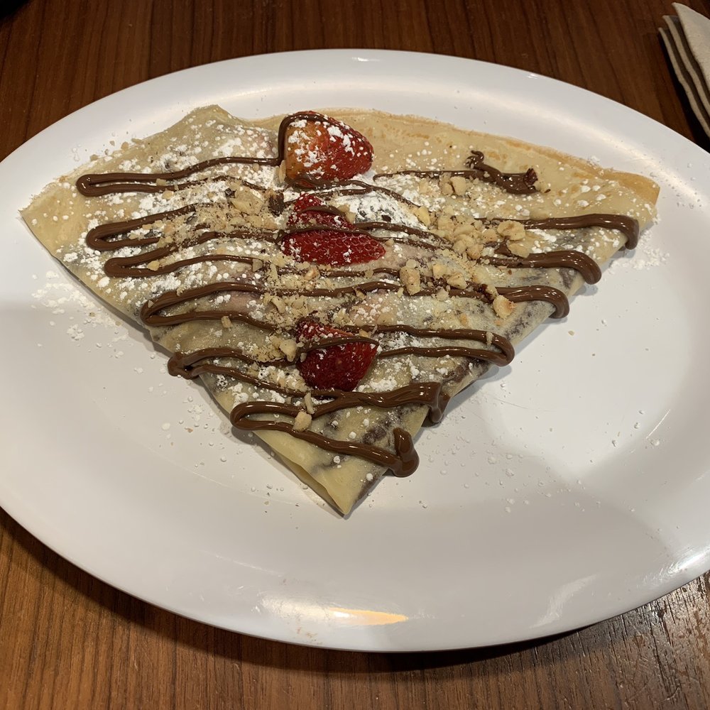Nutella Cafe - This awesome crepe with hazelnuts and strawberry and ofc Nutella!!!! - Desserts Near Me - Chicago, Illinois Nutella Cafe - This awesome crepe with hazelnuts and strawberry and ofc Nutella!!!! - Desserts Near Me - Chicago, Illinois