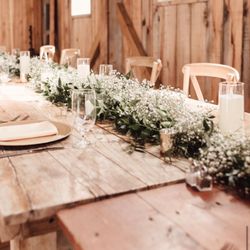 University Florist & Greenery - Head table greenery/baby's breath