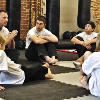 Dojo Chattanooga - Father and Son teaching the youth class. - Martial Arts Near Me - Chattanooga, Tennessee Dojo Chattanooga - Father and Son teaching the youth class. - Martial Arts Near Me - Chattanooga, Tennessee