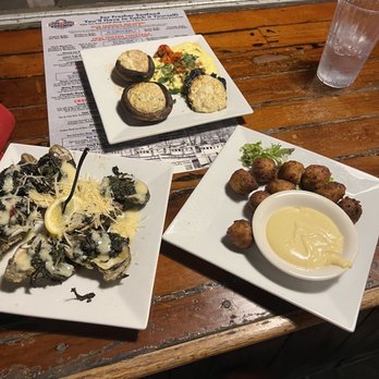 Conch Republic Seafood - 3 of the appetizers. Stuffed Mushrooms, Conch Fritters, and Baked Oysters! - Seafood Near Me - Key West, Florida