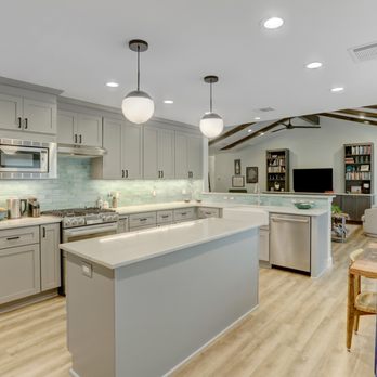 Adams Company - kitchen with island and dining table - General Contractors Near Me - Austin, Texas Adams Company - kitchen with island and dining table - General Contractors Near Me - Austin, Texas