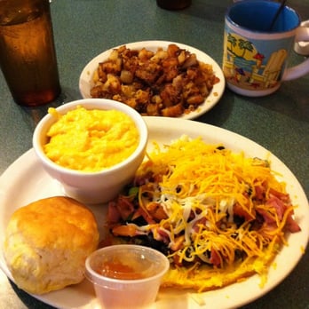 Brother Juniper's - Coastal Delight Open Face Omelet, Cheese Grits, and Home Fries. mmmm - Breakfast & Brunch Near Me - Memphis, Tennessee Brother Juniper's - Coastal Delight Open Face Omelet, Cheese Grits, and Home Fries. mmmm - Breakfast & Brunch Near Me - Memphis, Tennessee